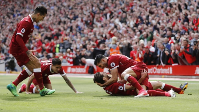 liverpool 039 s adam lallana celebrates scoring their third goal with team mates against middlesbrough on may 21 2017 photo reuters liverpool 039 s adam lallana celebrates scoring their third goal with team mates against middlesbrough on may 21 2017 photo reuters