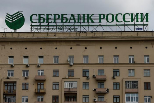 the logo of sberbank is seen on top of a building in central moscow russia photo reuters the logo of sberbank is seen on top of a building in central moscow russia photo reuters