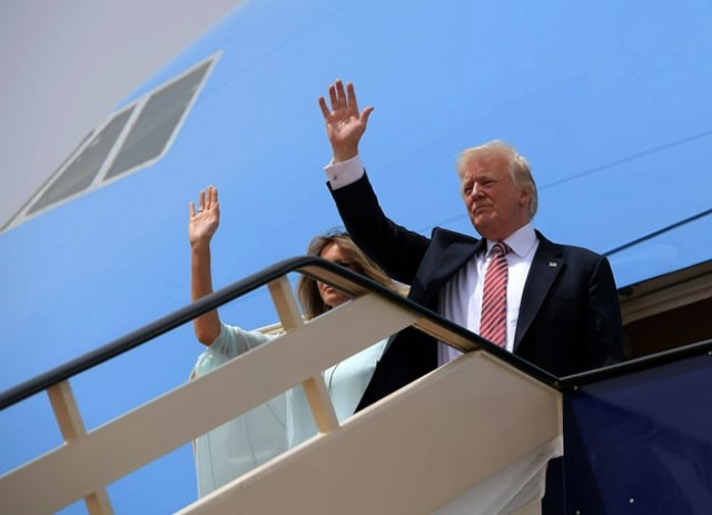 us president donald trump and first lady melania trump wave as they board air force one in riyadh as they head to israel on may 22 2017 photo afp us president donald trump and first lady melania trump wave as they board air force one in riyadh as they head to israel on may 22 2017 photo afp