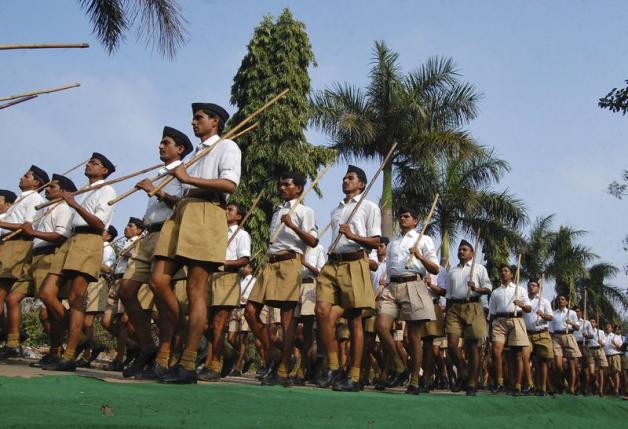 activists from the rashtriya swayamsevak sangh rss a hindu hardline group hold bamboo sticks as they take part in a march in bhopal february 23 2014 photo reuters