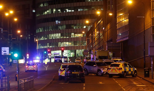 vehicles are seen near a police cordon outside the manchester arena where u s singer ariana grande had been performing in manchester northern england britain may 23 2017 photo reuters