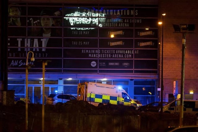 a police van and an ambulance are seen outside the manchester arena photo reuters