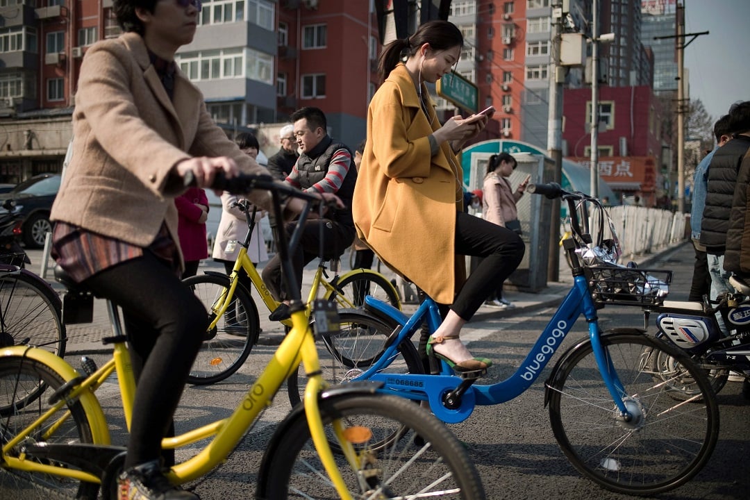 beijing plans to limit total number of shared bikes photo afp