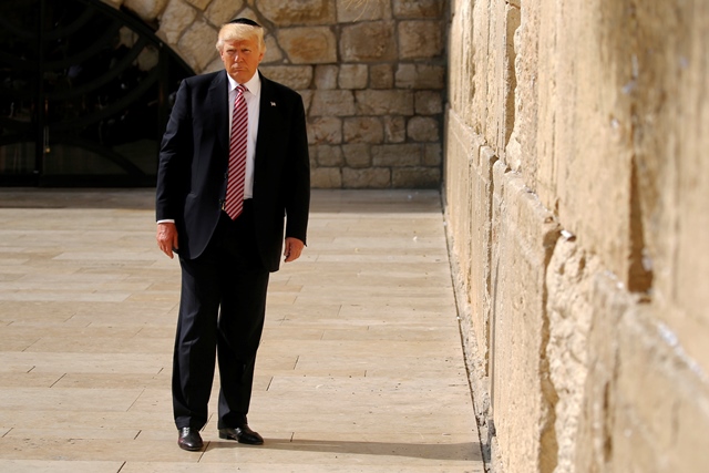 u s president donald trump stands after leaving a note at the western wall in jerusalem may 22 2017 photo reuters