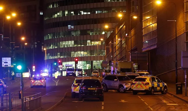 vehicles are seen near a police cordon outside the manchester arena where u s singer ariana grande had been performing in manchester northern england britain may 23 2017 photo reuters vehicles are seen near a police cordon outside the manchester arena where u s singer ariana grande had been performing in manchester northern england britain may 23 2017 photo reuters