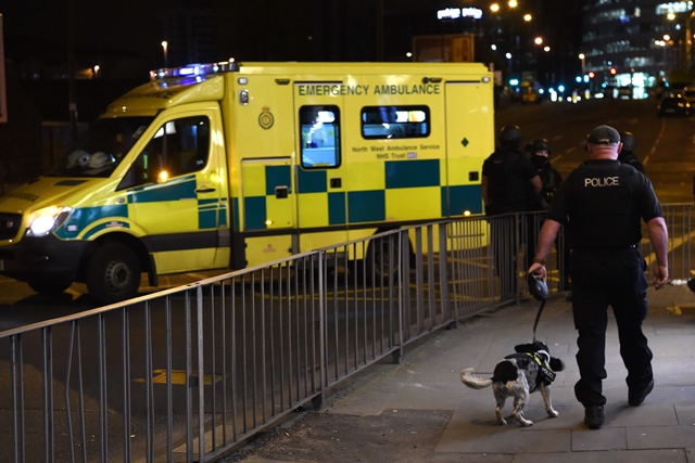 emergency response vehicles arrive at the scene of a suspected terrorist attack during a pop concert by us star ariana grande in manchester northwest england on may 23 2017 photo afp