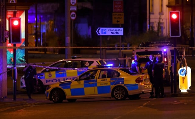 police deploy at scene of explosion in manchester england on may 23 2017 at a concert photo afp police deploy at scene of explosion in manchester england on may 23 2017 at a concert photo afp