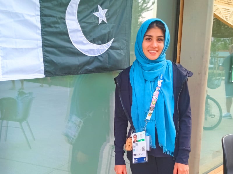 gutsy athlete faiqa riaz seen in olympics village is upbeat about today s 100m track event at paris games photo natasha raheel