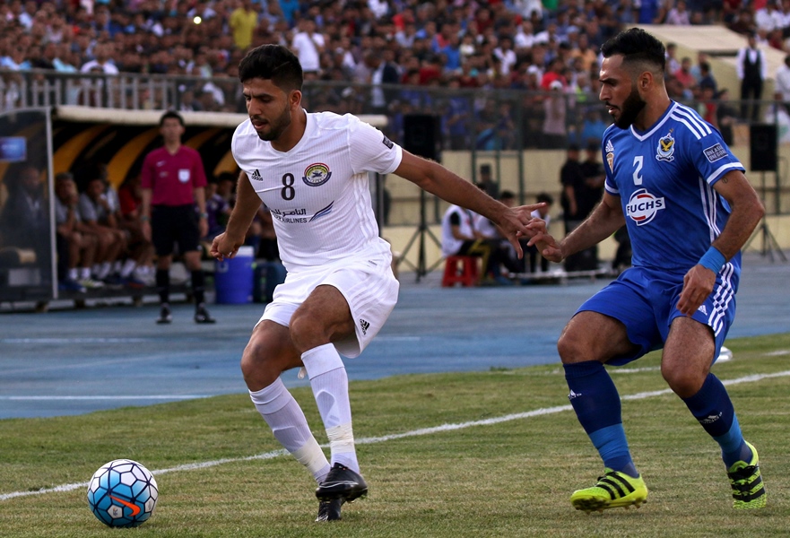 al zawraa player mohannad abdulraheem l vies for the ball against air force player samal saeed during their afc cup west zonal semi final football match in arbil the capital of the kurdish autonomous region in northern iraq on may 22 2017 photo afp