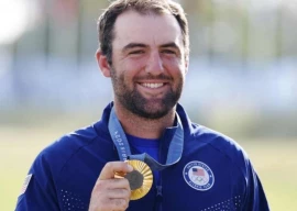 scheffler shows off olympic gold