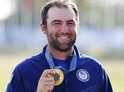 scheffler shows off olympic gold