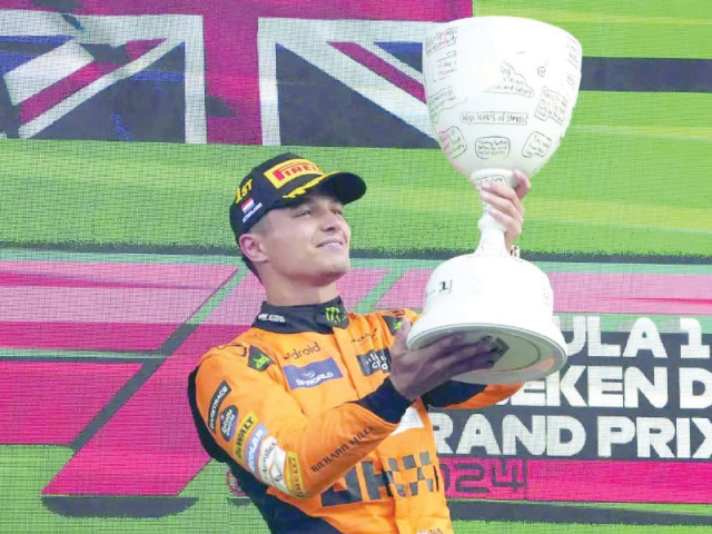 mclaren s lando norris celebrates his victory at the zandvoort circuit photo afp mclaren s lando norris celebrates his victory at the zandvoort circuit photo afp