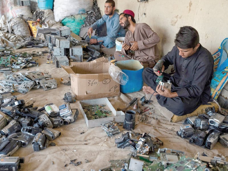 afghan smelters extract gold from cameras and car navigation screen devices at a workshop in spin boldak photo afp