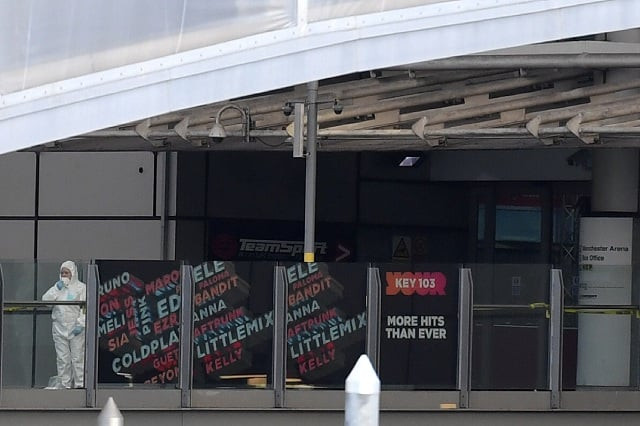 a police forensic officer stands by one of the entrances to the manchester arena scene of a terror attack during a pop concert by us star ariana grande in manchester northwest england on may 23 2017 nineteen people have been killed and dozens injured in britain 039 s deadliest teror attack in over a decade photo afp a police forensic officer stands by one of the entrances to the manchester arena scene of a terror attack during a pop concert by us star ariana grande in manchester northwest england on may 23 2017 nineteen people have been killed and dozens injured in britain 039 s deadliest teror attack in over a decade photo afp