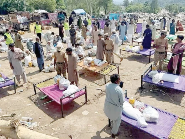 during its relief operation in buner the pakistan army distributes ration packages among flood affected families buner district bore the brunt of recent floods in khyber pakhtunkhwa photo nni