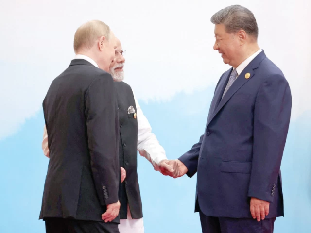 russia s president vladimir putin speaks with india s prime minister narendra modi and china s president xi jinping during the sco summit in tianjin photo afp russia s president vladimir putin speaks with india s prime minister narendra modi and china s president xi jinping during the sco summit in tianjin photo afp