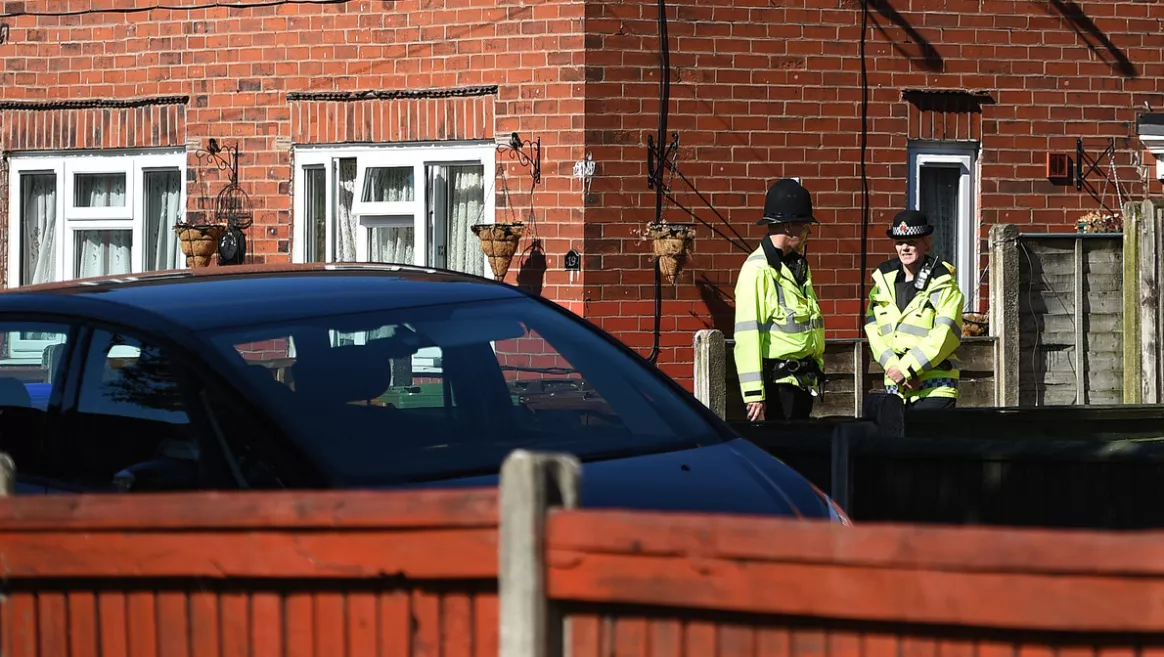 police officers stand on duty outside a house r in fallowfield manchester in northwest england on may 23 2017 photo afp police officers stand on duty outside a house r in fallowfield manchester in northwest england on may 23 2017 photo afp