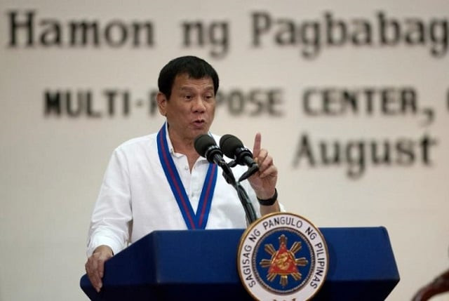 philippine president rodrigo duterte gestures while delivering a speech during the 115th police service anniversary at the philippine national police pnp headquarters in quezon city metro manila philippines photo reuters