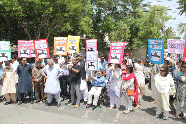 led by najeeb wali former vice president of cbc the protesters gathered outside the office thursday morning photo ayesha mir