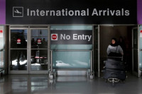 an international traveler arrives after us president donald trump 039 s executive order travel ban at logan airport in boston massachusetts us photo reuters