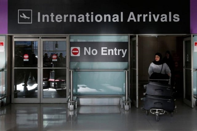 an international traveler arrives after us president donald trump 039 s executive order travel ban at logan airport in boston massachusetts us photo reuters an international traveler arrives after us president donald trump 039 s executive order travel ban at logan airport in boston massachusetts us photo reuters