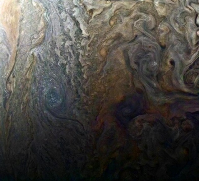 nasa 039 s enhanced color image of a mysterious dark spot on jupiter shows a jovian quot galaxy quot of swirling storms in this image captured by nasa 039 s juno spacecraft on february 2 2017 at 5 13 a m pdt 8 13 a m edt at an altitude of 9 000 miles 14 500 kilometers above jupiter 039 s cloud tops photo reuters