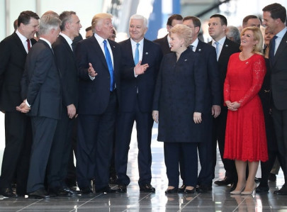trump shoves fellow nato leader aside on his first summit