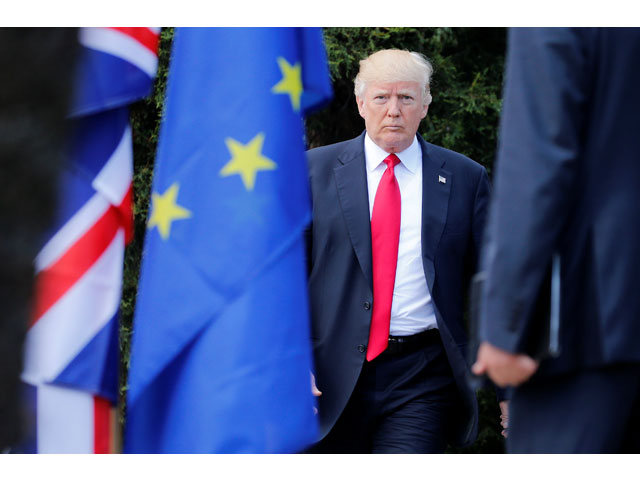 us president donald trump arrives for a family photo at the g7 summit expanded session in taormina sicily italy may 27 2017 photo reuters