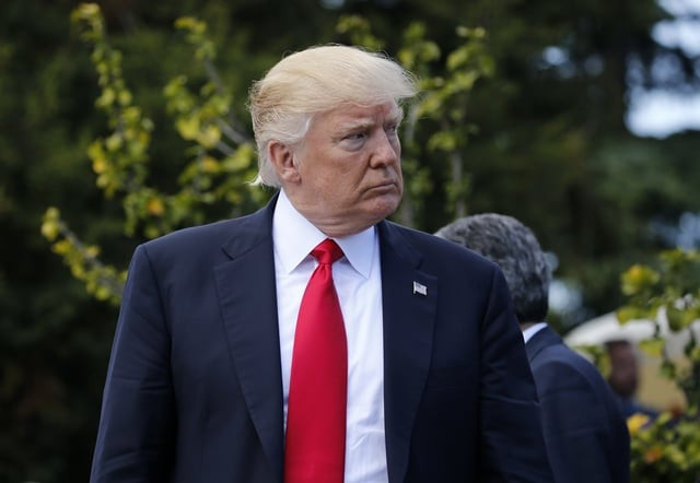 us president donald trump arrives for a family photo with african leaders after an expanded session during the summit of the heads of state and of government of the g7 the group of most industrialized economies plus the european union on may 27 2017 photo afp us president donald trump arrives for a family photo with african leaders after an expanded session during the summit of the heads of state and of government of the g7 the group of most industrialized economies plus the european union on may 27 2017 photo afp