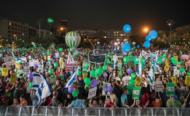 a general view shows protesters gathering at a mass demonstration against 50 years of occupation titled quot two states   one hope quot on may 27 2017 at the rabin square in the israeli coastal city of tel aviv photo afp