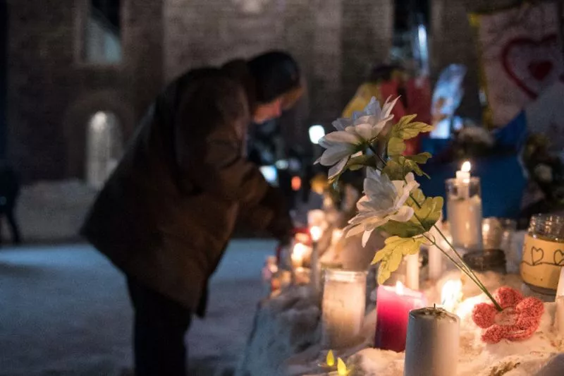 people place candles near a mosque that was the location of a shooting spree in quebec city canada which left six people dead and eight wounded photo afp people place candles near a mosque that was the location of a shooting spree in quebec city canada which left six people dead and eight wounded photo afp