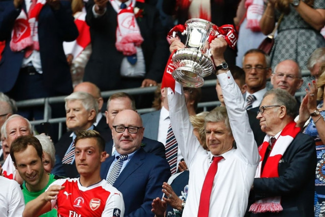 arsenal 039 s french manager arsene wenger lifts the fa cup trophy after their win over chelsea in the english fa cup final football match between arsenal and chelsea at wembley stadium in london on may 27 2017 aaron ramsey scored a 79th minute header to earn arsenal a stunning 2 1 win over double chasing chelsea on saturday and deliver embattled manager arsene wenger a record seventh fa cup photo afp arsenal 039 s french manager arsene wenger lifts the fa cup trophy after their win over chelsea in the english fa cup final football match between arsenal and chelsea at wembley stadium in london on may 27 2017 aaron ramsey scored a 79th minute header to earn arsenal a stunning 2 1 win over double chasing chelsea on saturday and deliver embattled manager arsene wenger a record seventh fa cup photo afp
