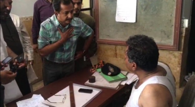 pti leader negotiates with the site sho for his arrested party activists 039 release photo screengrab