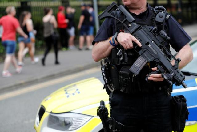 an armed policeman is seen outside the lancashire county cricket club emirates old trafford in manchester britain may 27 2017 photo reuters an armed policeman is seen outside the lancashire county cricket club emirates old trafford in manchester britain may 27 2017 photo reuters