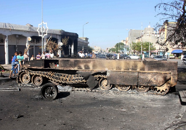 a damaged military vehicle is seen following heavy clashes between rival factions in abu salim district in tripoli libya may 28 2017 photo reuters