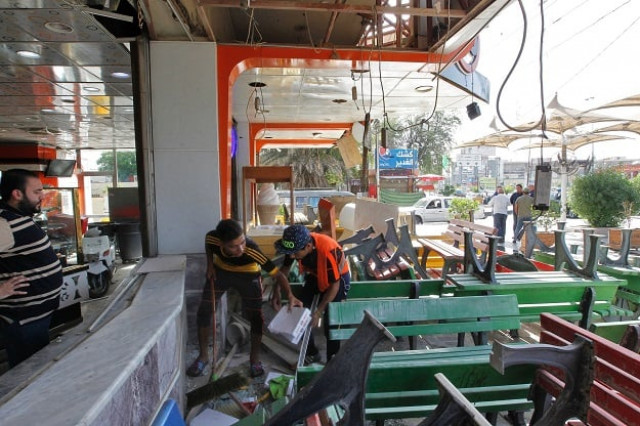 iraqis check an ice cream shop in baghdad 039 s karrada district in the aftermath of a car bom explosion on may 30 2017 photo afp iraqis check an ice cream shop in baghdad 039 s karrada district in the aftermath of a car bom explosion on may 30 2017 photo afp