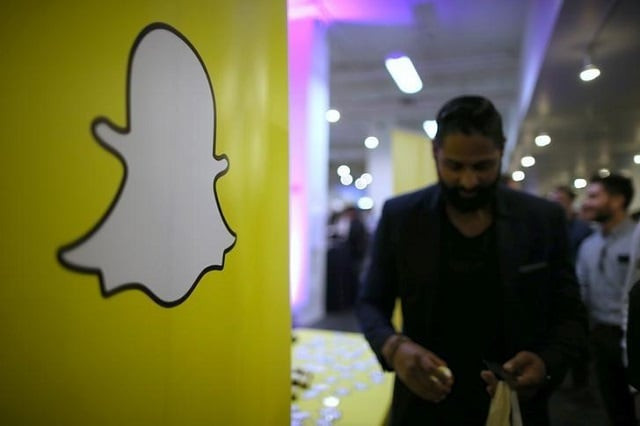 the logo of messaging app snapchat is seen at a booth at techfair la a technology job fair in los angeles california u s january 26 2017 photo reuters the logo of messaging app snapchat is seen at a booth at techfair la a technology job fair in los angeles california u s january 26 2017 photo reuters