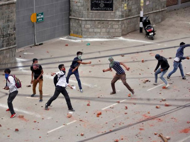 demonstrators throw stones towards the indian police during a protest in srinagar may 9 2017 photo reuters