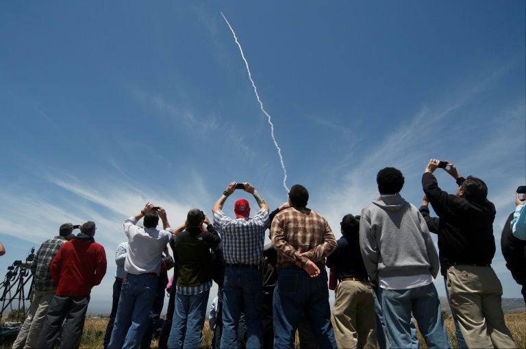 people watch a ground based interceptor missle take off at vandenberg air force base california on may 30 2017 photo afp