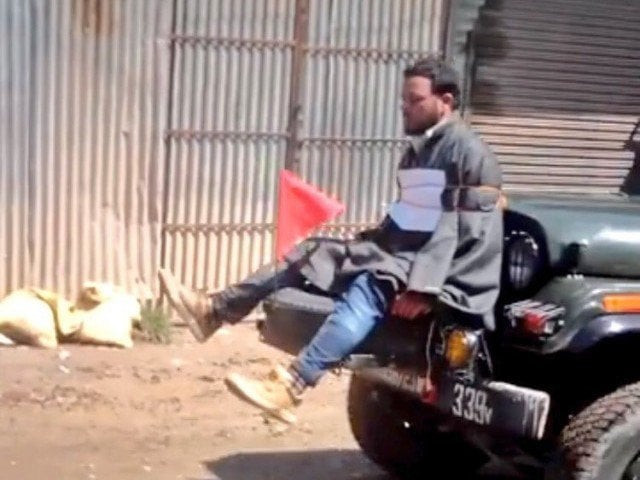 kashmiri youth tied in front of indian army vehicle as human shield photo twitter kashmiri youth tied in front of indian army vehicle as human shield photo twitter
