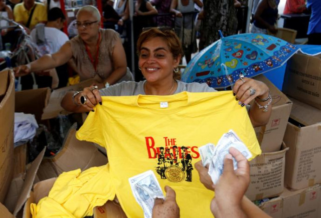 beatles fans buy shirts during an open air covers concert in celebration of the release of the band 039 s landmark album quot sgt pepper 039 s lonely hearts club band quot 50 years ago in havana cuba june 1 2017 reuters stringer beatles fans buy shirts during an open air covers concert in celebration of the release of the band 039 s landmark album quot sgt pepper 039 s lonely hearts club band quot 50 years ago in havana cuba june 1 2017 reuters stringer