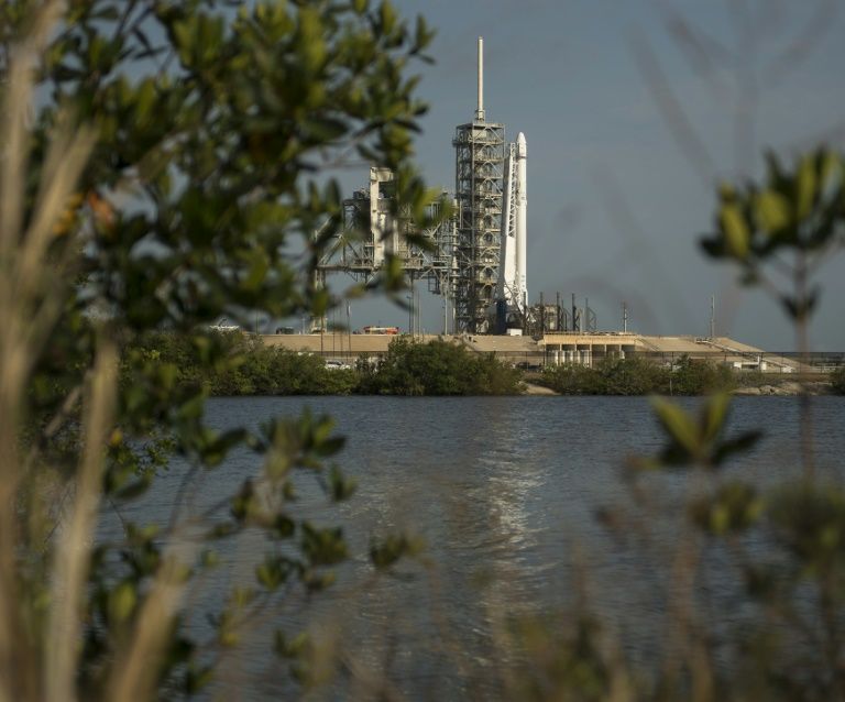 this image released by nasa shows the spacex falcon 9 rocket with the dragon spacecraft onboard shortly after being raised vertical at launch complex 39a at nasa 039 s kennedy space center in cape canaveral florida