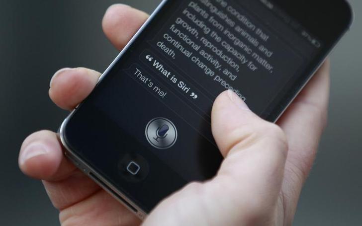 the company is expected to announce plans next week to make siri voice assistant work with larger variety of apps photo reuters