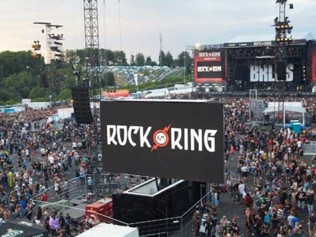 festival goers leave the venue of the rock am ring music festival in june 2 2017 in nuerburg following an evacuation alert amid a possible 039 terrorist threat 039 photo afp