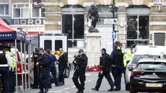 armed police on borough high street close to borough market background in london photo afp