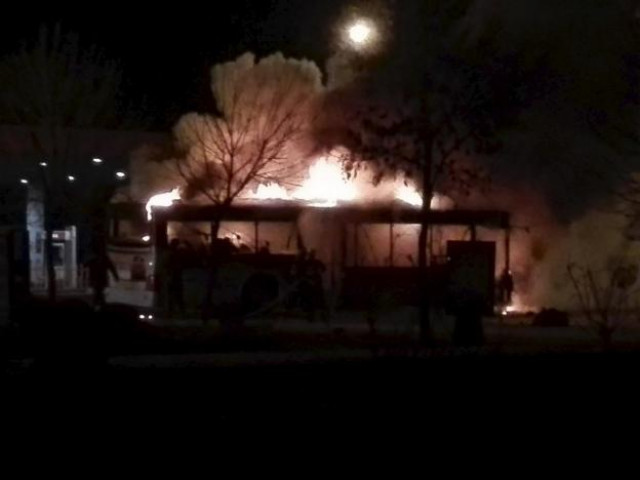a bus catches a fire on a street photo reuters a bus catches a fire on a street photo reuters