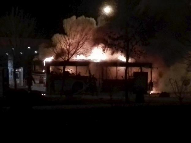 a bus catches a fire on a street photo reuters