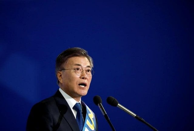 moon jae in speaks after winning the nomination as a presidential candidate of the minjoo party during a national convention in seoul south korea photo reuters