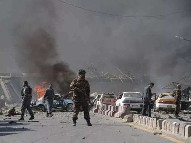 an afghan security force member stands at the site of a car bomb attack in kabul on may 31 2017 photo afp an afghan security force member stands at the site of a car bomb attack in kabul on may 31 2017 photo afp
