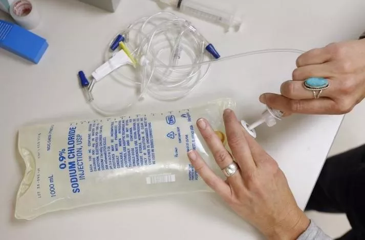 a nurse prepares a bag of saline photo reuters a nurse prepares a bag of saline photo reuters